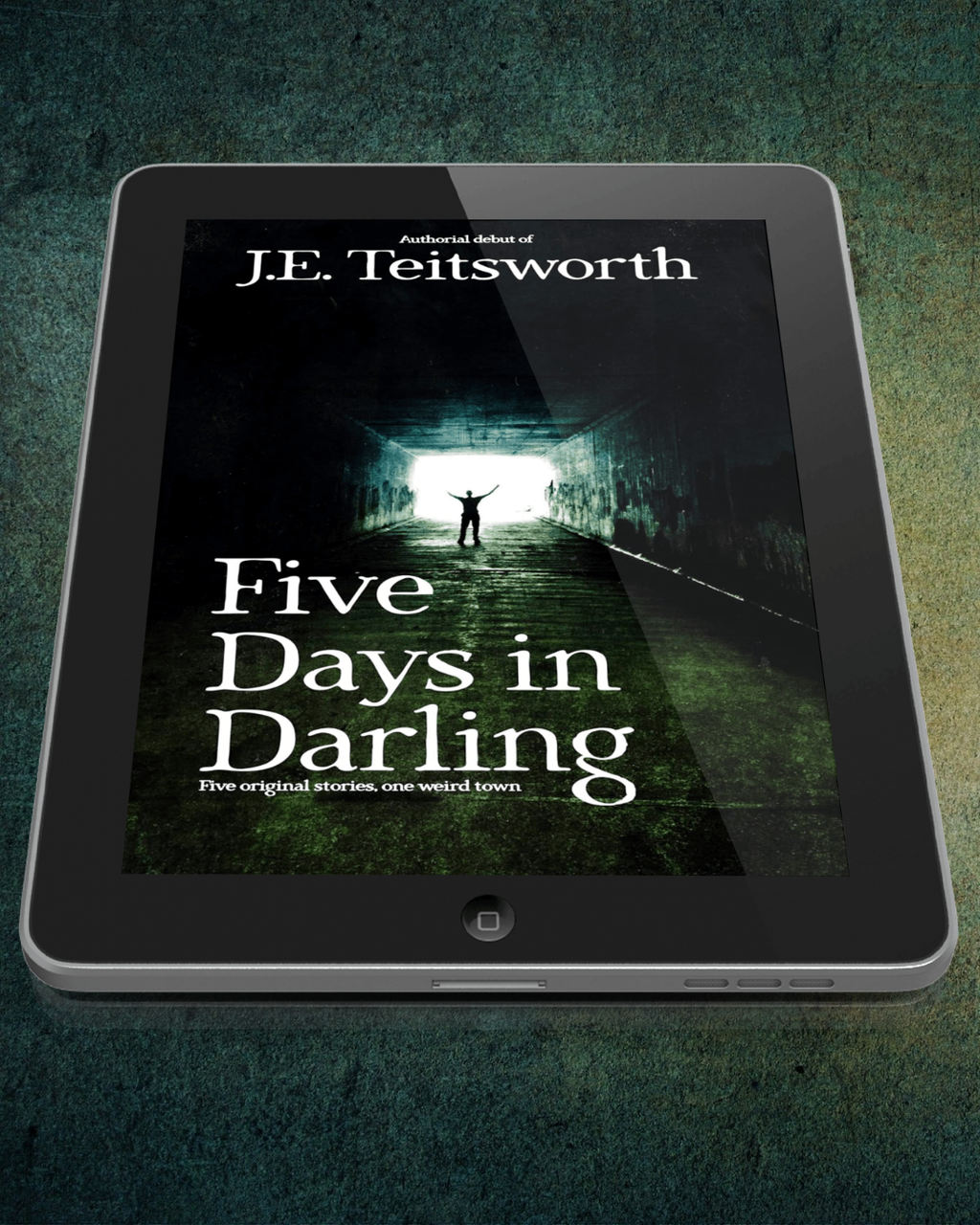 A tablet device displaying the book cover of 'Five Days in Darling' by J.E. Teitsworth