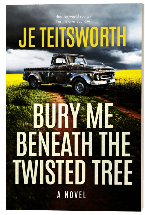 Book cover for the novel 'Bury Me Beneath the Twisted Tree' by JE Teitsworth, featuring a dark vintage pickup truck on a dirt path through a yellow field under a stormy sky.