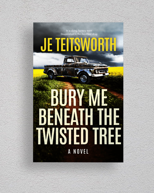 A book cover for the novel 'Bury Me Beneath the Twisted Tree' by Je Teisworth, displayed against a light gray textured wall. The cover features a dramatic scene of an old pickup truck parked on a dirt path in a field of yellow flowers under a stormy sky.
